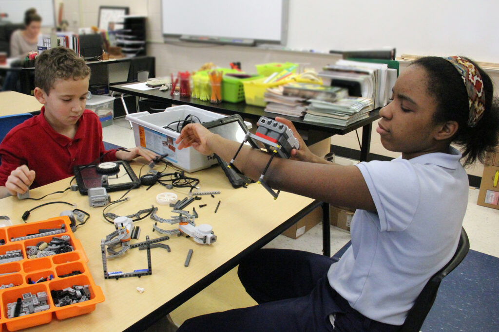 Building Robotic Arms While Developing a Love for Science