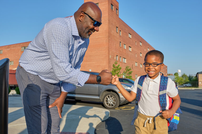 Jarrett Young greets a student.